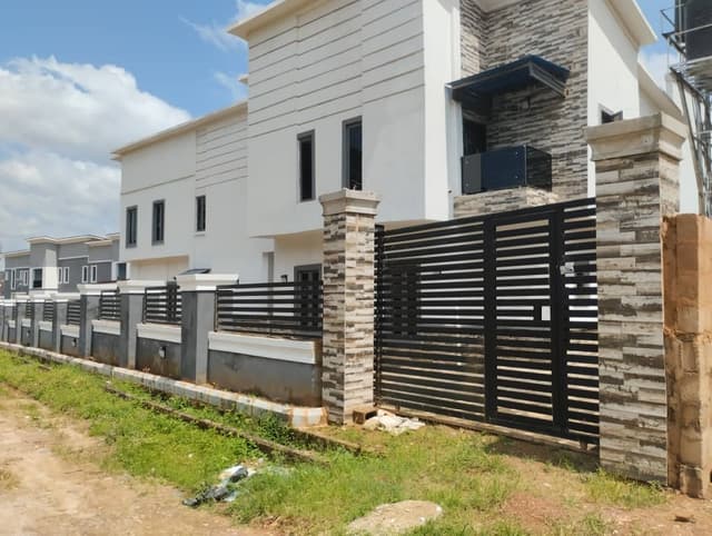 Two units of 3 bedroom duplex with security house